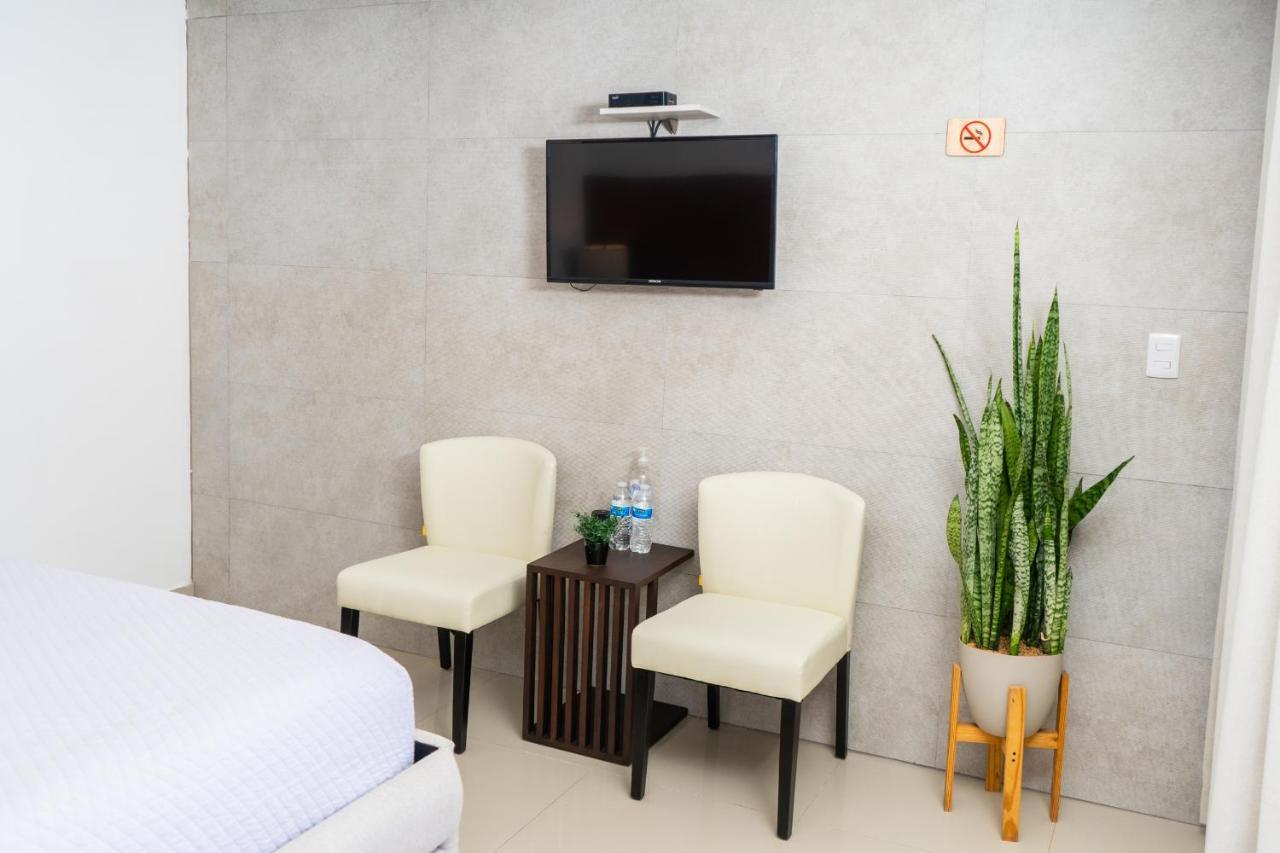 Equinoccio Hotel Santa Ana Buitenkant foto
